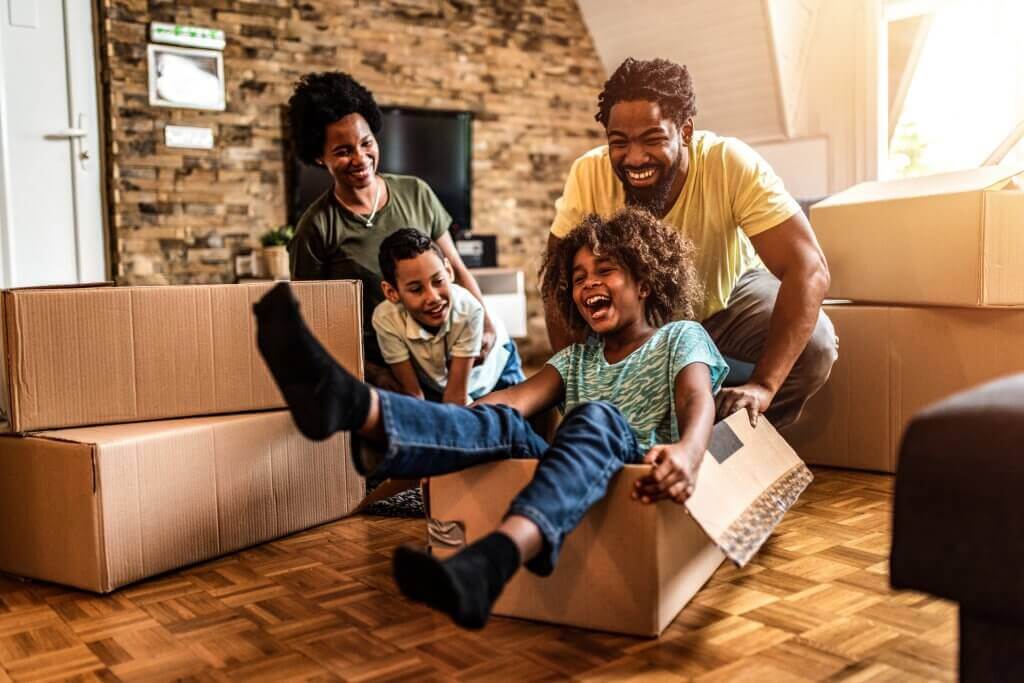 A happy family playing with kids whole Moving 