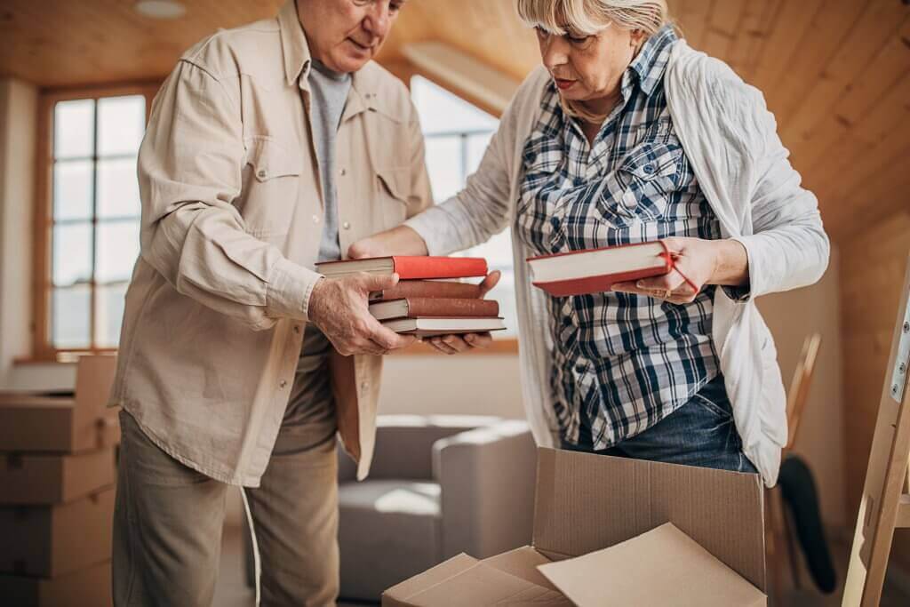 Two Senior moving books