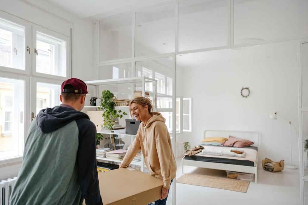 Young couple moving into a new apartment