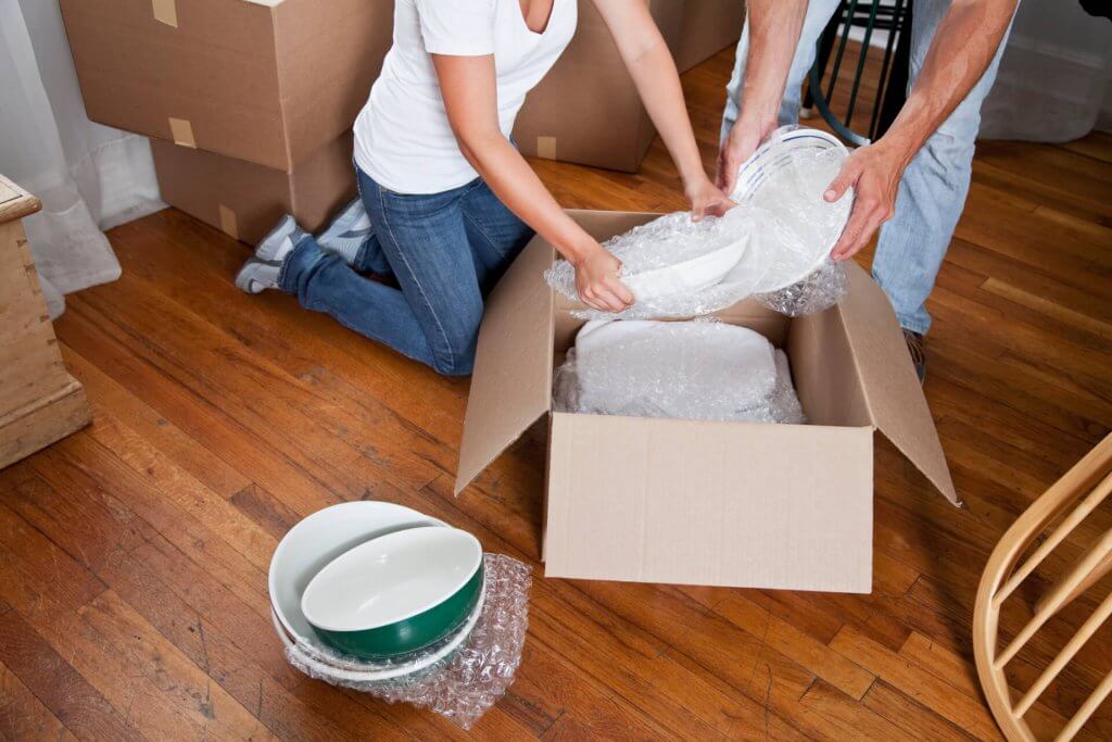 Young couple moving into new home