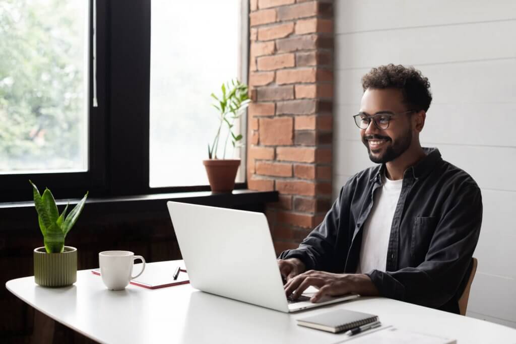 Young man working from home.