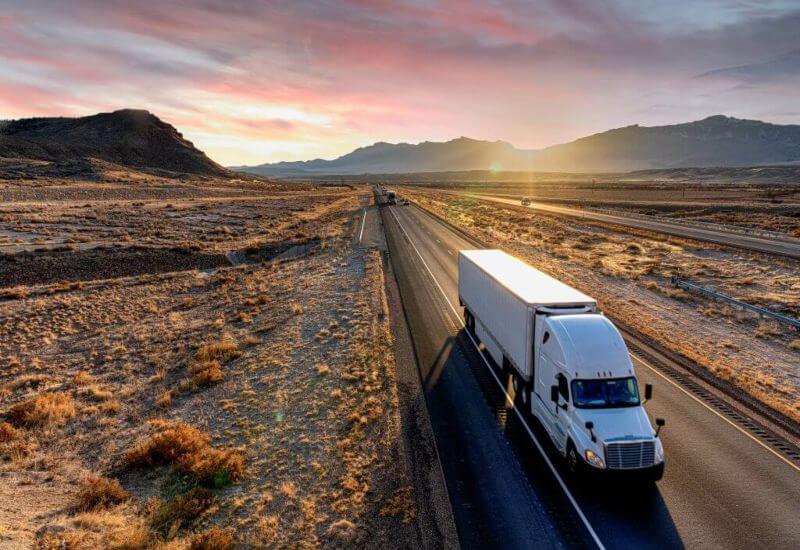 The Semi Trailer Truck Heading down Highway